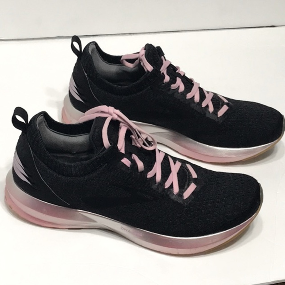 BROOKS DNA AMP black with pink, used in good Care.